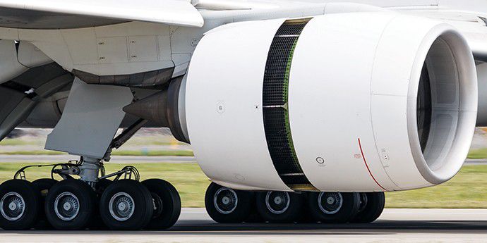 Aircraft engine nacelle with DuPont Vespel thrust reverser channel