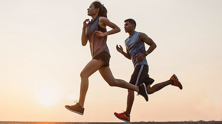 DuPont consumer product design in action. A man and woman jogging together under a clear sky