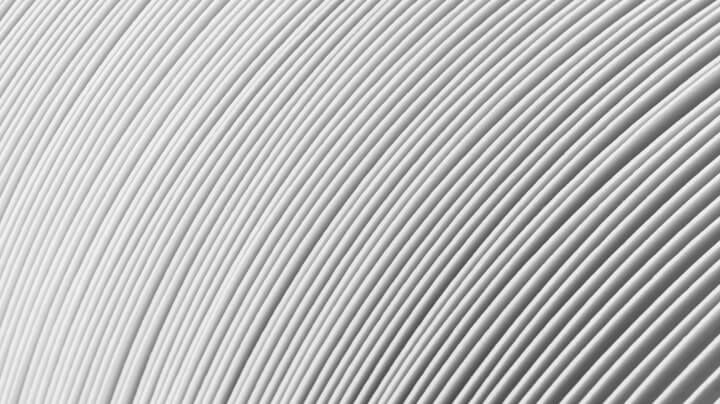  Extreme close-up of a stack of folded white paper produced by the pulp and paper industry.