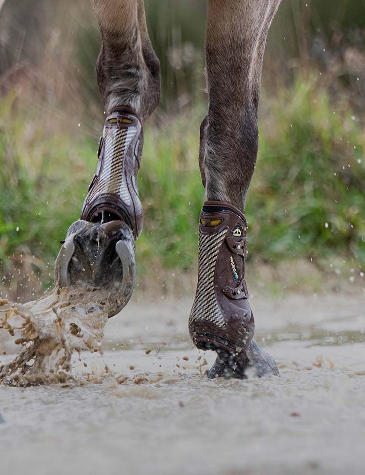 Veredus® Kevlar® open front boots providing lightweight protection and impact resistance for a horse