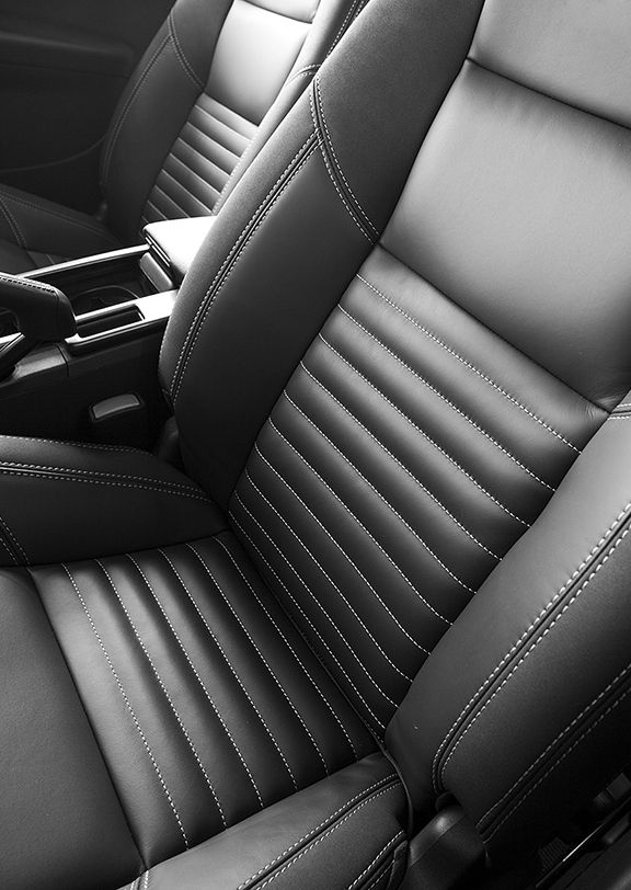 Black and white Ford car seats.